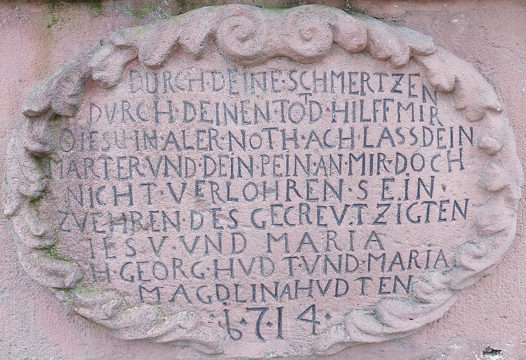 Inschrift auf dem Kreuz